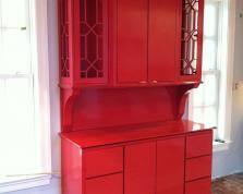 image of a red custom handcrafted cabinet